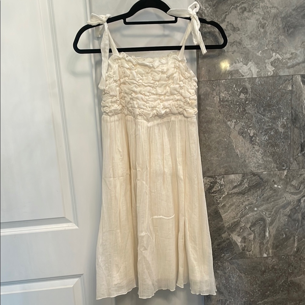 Elegant Cream Sleeveless Dress